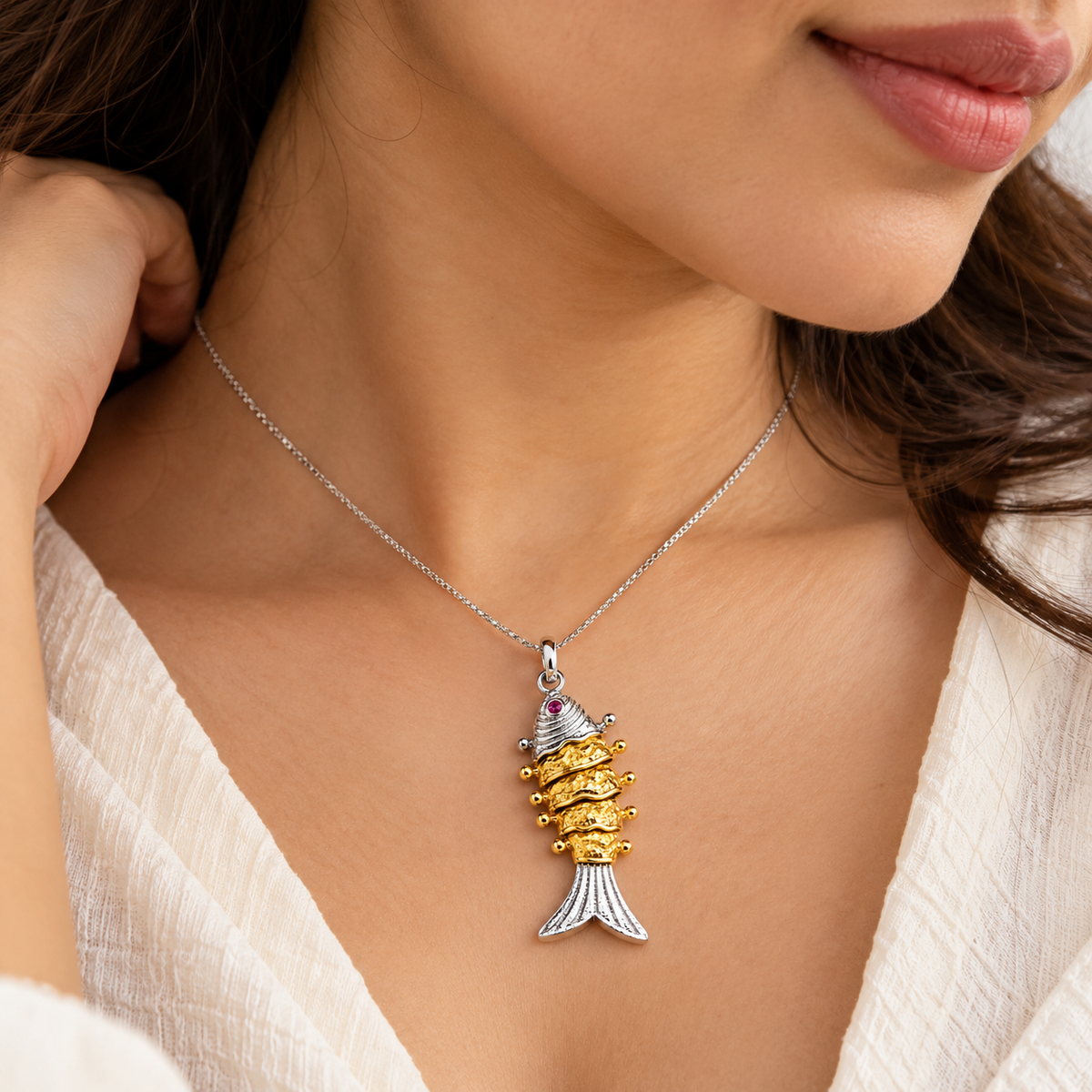 Flexible fish pendent